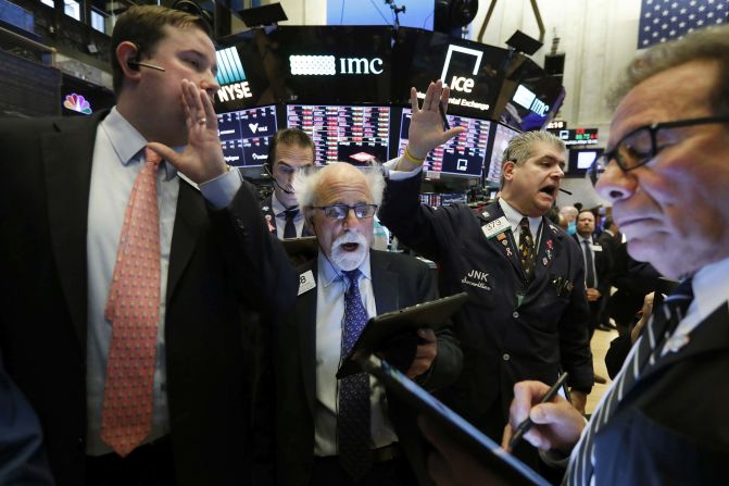 Traders work on the floor of the New York Stock Exchange on March 9, 2020. <a href="https://www.cnn.com/2020/03/08/investing/stock-dow-futures-coronavirus/index.html" target="_blank">Stocks plummeted</a> as coronavirus worries and an oil price race to the bottom weighed on global financial markets.