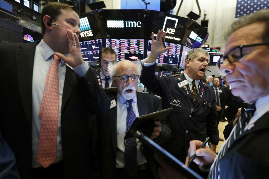 Traders work on the floor of the New York Stock Exchange on March 9. <a href="https://www.cnn.com/2020/03/08/investing/stock-dow-futures-coronavirus/index.html" target="_blank">Stocks plummeted</a> as coronavirus worries and an oil price race to the bottom weighed on global financial markets.