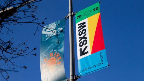 SXSW 2020 banners are seen in the Red River Cultural District on March 6, 2020 in Austin Texas. 