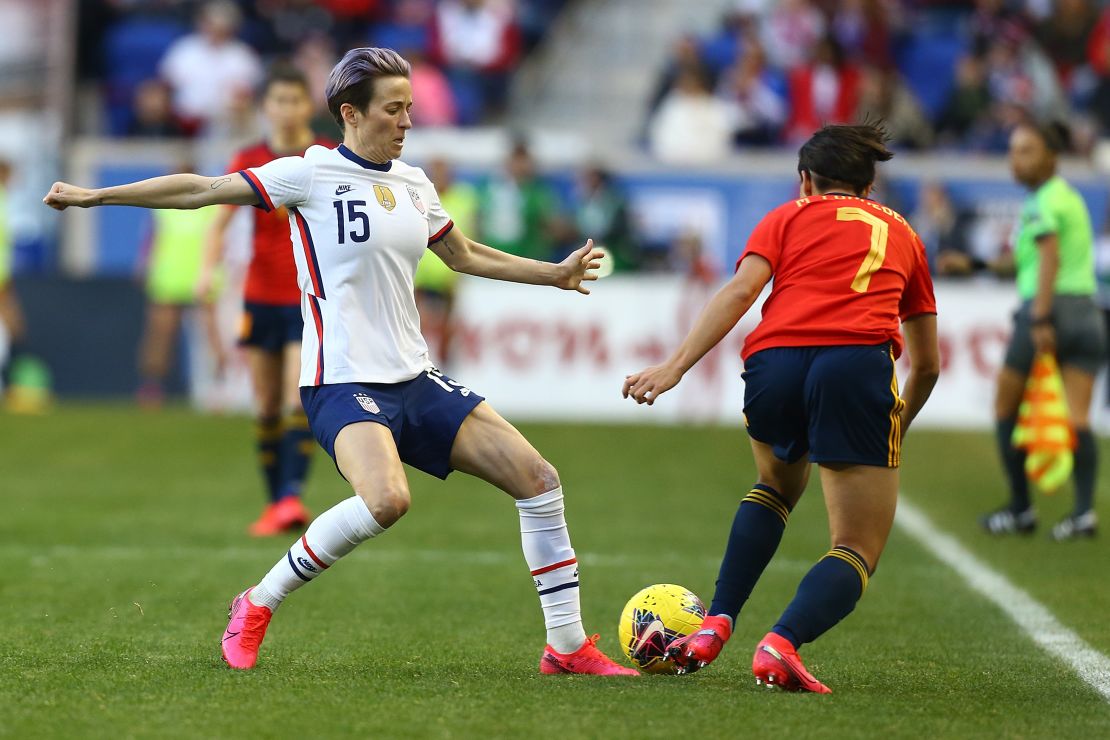 Marta Corredera goes past the USWNT's Megan Rapinoe during the She Believes Cup clash.