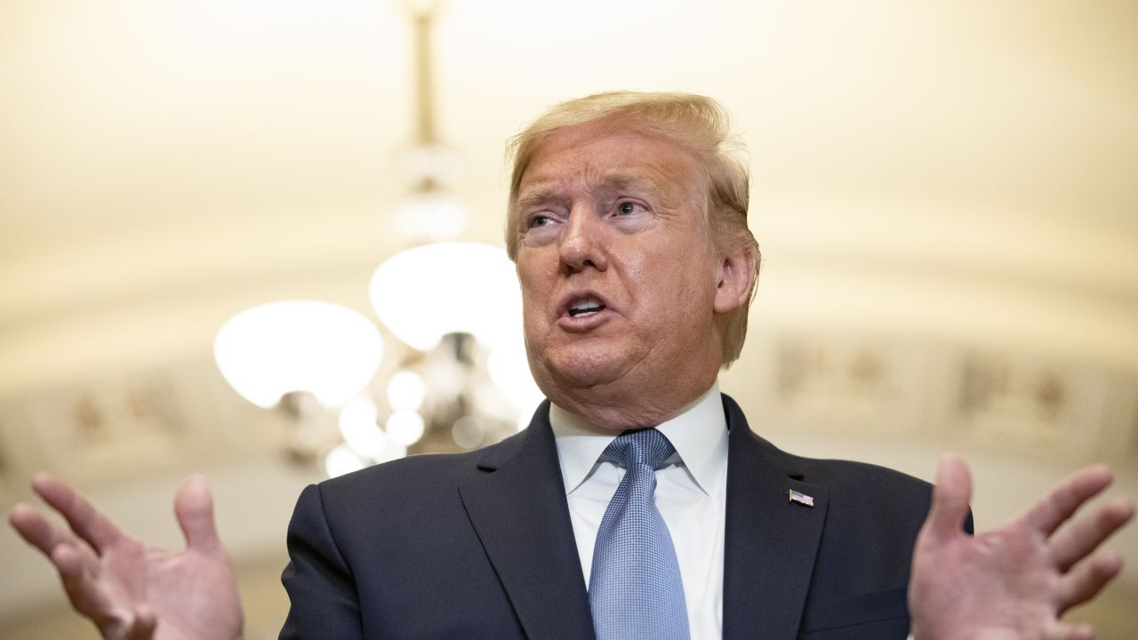 President Donald Trump talks to reporters at the Capitol after attending the Senate Republicans weekly policy luncheon on March 10, 2020.