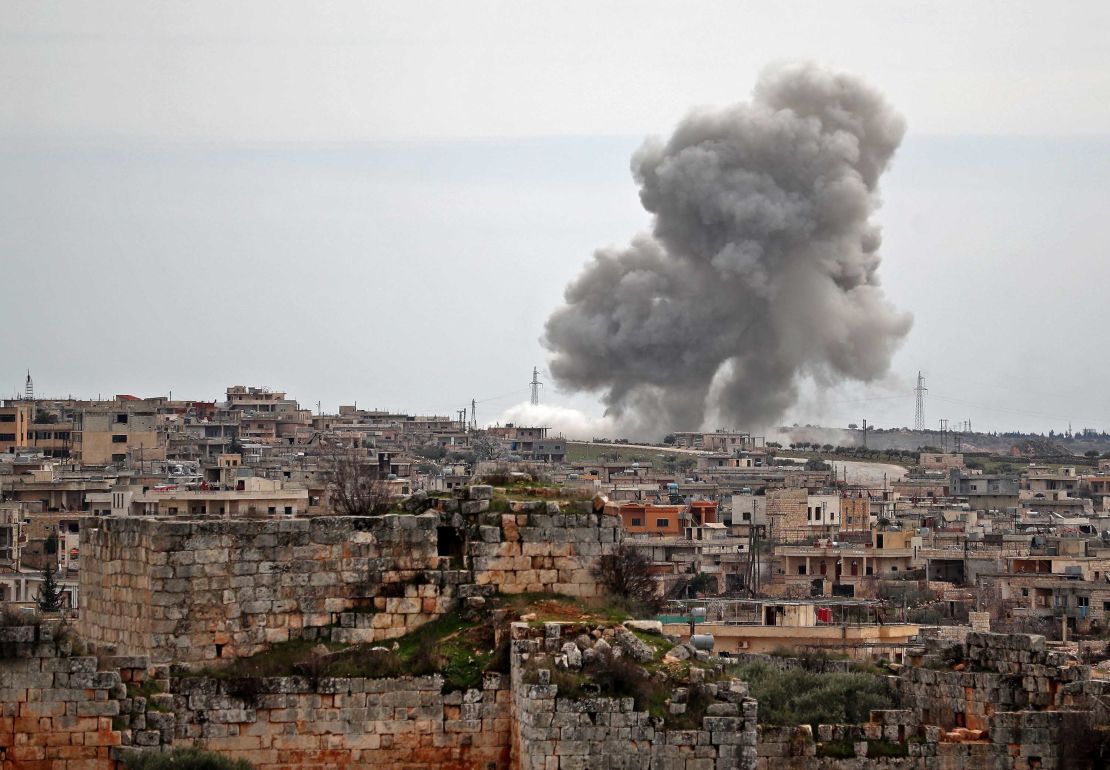 Plumes of smoke rise following Russian airstrikes on the village of al-Bara in the southern part of Syria's northwestern Idlib province on March 5, 2020.