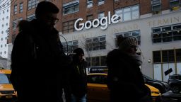 People walk past a Google office building on 9th Avenue in Chelsea district on December 30, 2017 in New York City.