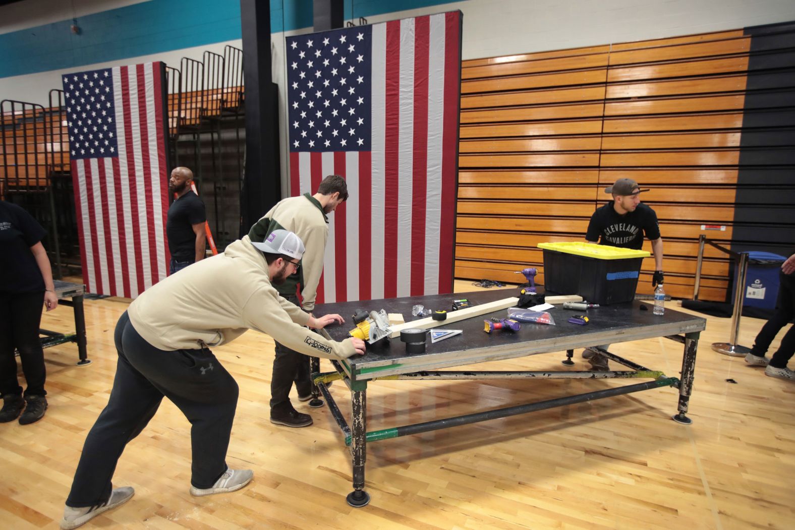 Workers in Cleveland begin to tear down the setup at Cuyahoga Community College, where Biden was scheduled to hold an election-night rally on Tuesday. Both Biden and US Sen. Bernie Sanders canceled their Tuesday night rallies as a precaution against the coronavirus.