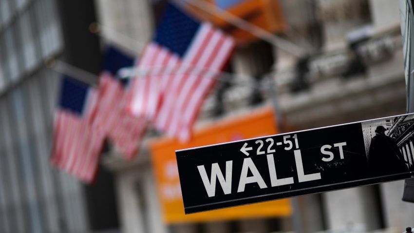FILE - This Jan. 31, 2020, file photo shows a Wall Street sign in front of the New York Stock Exchange. (AP Photo/Mark Lennihan, File)