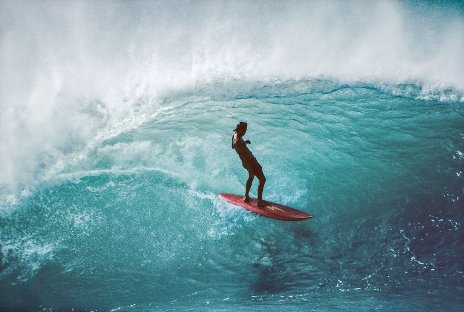 Surfer Gerry Lopez pictured riding Hawaii's famous Banzai Pipeline. Scroll through to see more of Jeff Divine's photos from the 1970s.