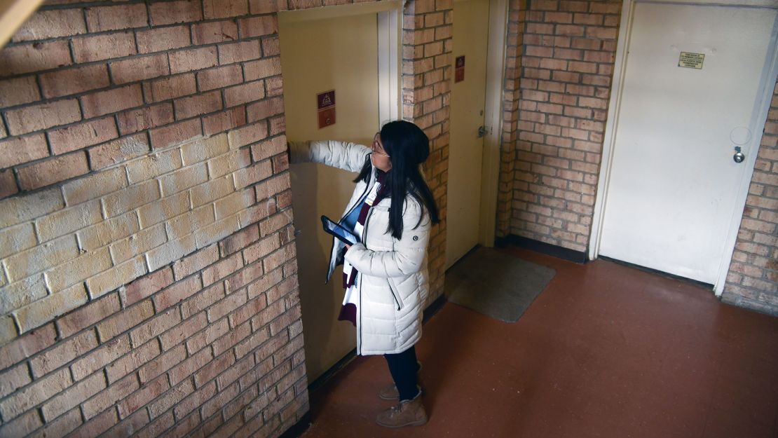 In anticipation of the 2020 census, advocates like Julia Aviles Zavala, shown here knocking on a door in Maryland in January, have been conducting outreach efforts to persuade immigrants and low-income residents to participate.