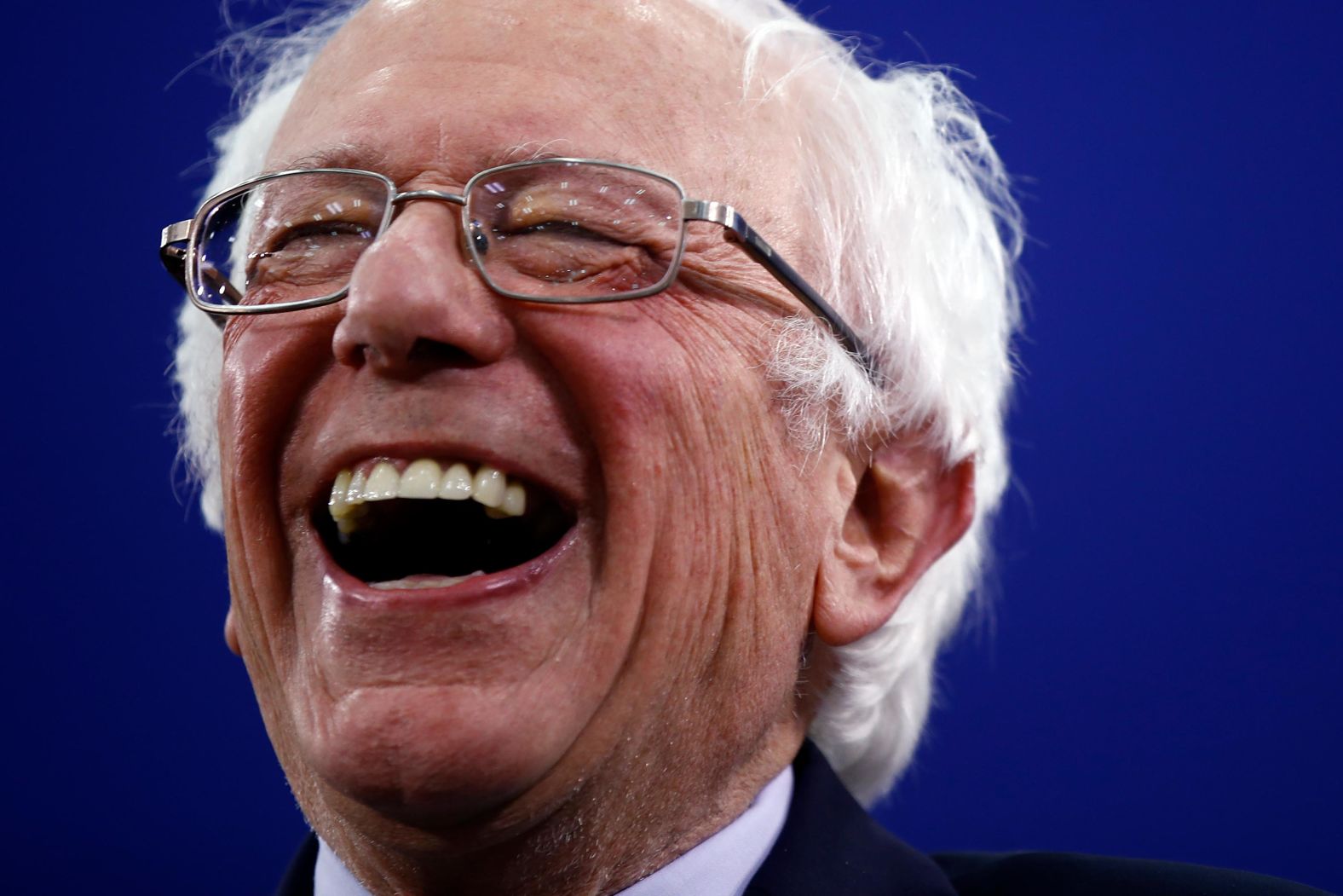 Sanders laughs during a primary-night rally in Manchester, New Hampshire, in February 2020. Sanders won <a  target="_blank">the primary,</a> just as he did in 2016.