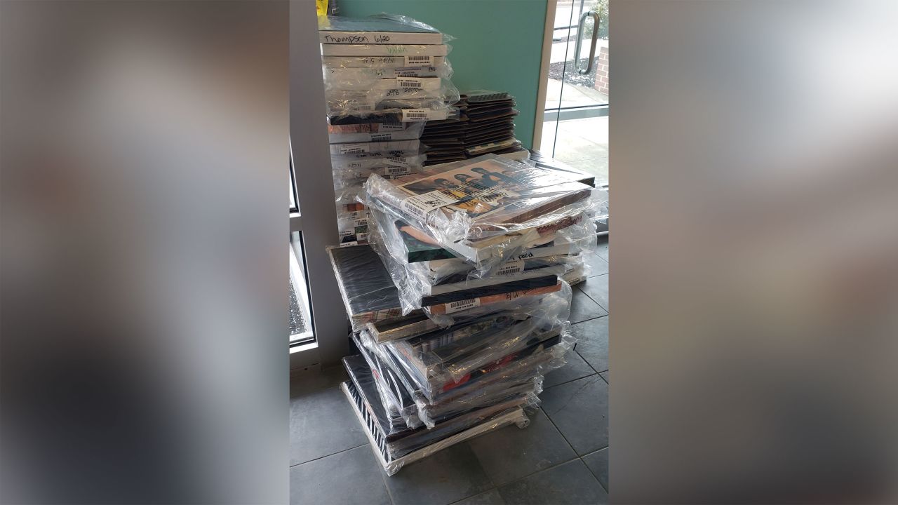 Stack of canvases found inside closed portrait store.