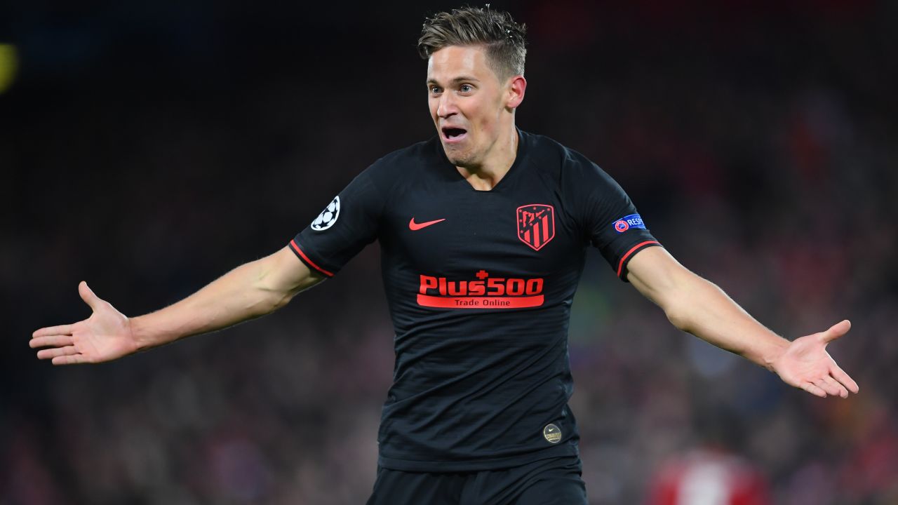 Marcos Llorente celebrates his second goal in extra time.