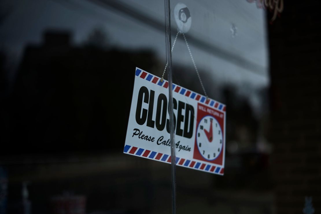 A sign in the containment zone in New Rochelle, New York, on Wednesday tells customers the business is closed.