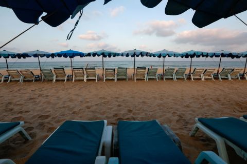 Empty chairs are seen on a beach in Phuket, Thailand, on March 11.
