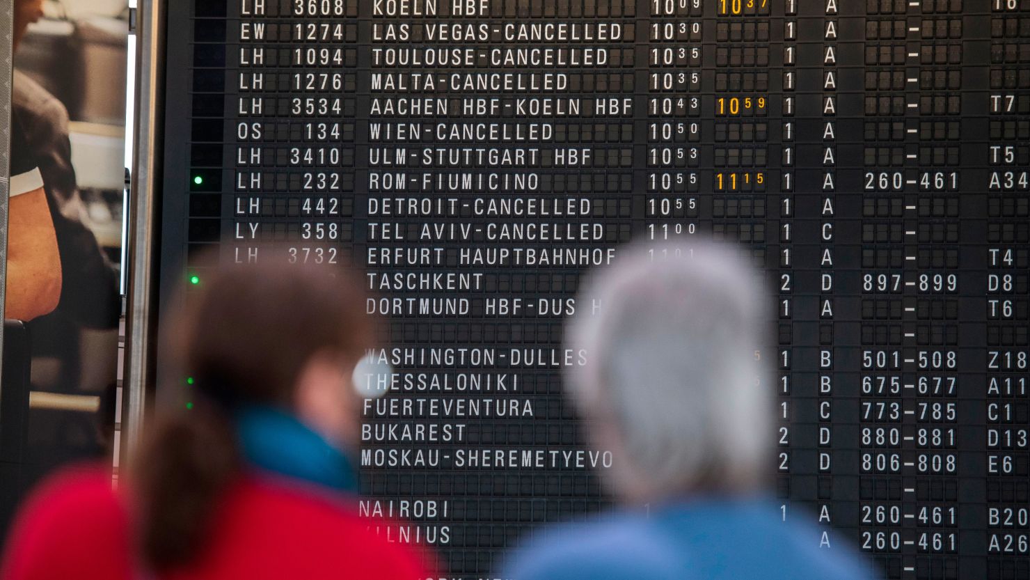 The destination board shows canceled flights to America and Israel at Frankfurt Airport on March 12, 2020. 
