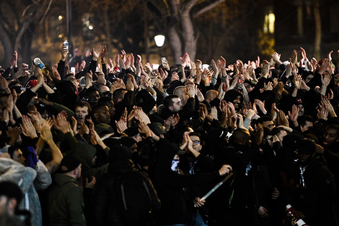 Supporters celebrate PSG's second goal against Dortmund after the match was played behind closed doors.