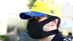 MELBOURNE, AUSTRALIA - MARCH 12: Esteban Ocon of France and Renault Sport F1 walks through the Paddock wearing a mask during previews ahead of the F1 Grand Prix of Australia at Melbourne Grand Prix Circuit on March 12, 2020 in Melbourne, Australia. (Photo by Mark Thompson/Getty Images)