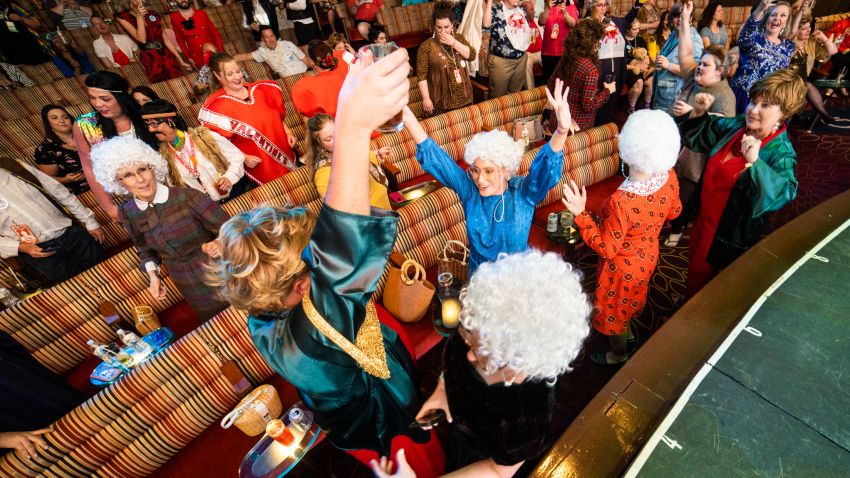 Fans of "The Golden Girls" live it up during the Golden Fans at Sea costume contest.