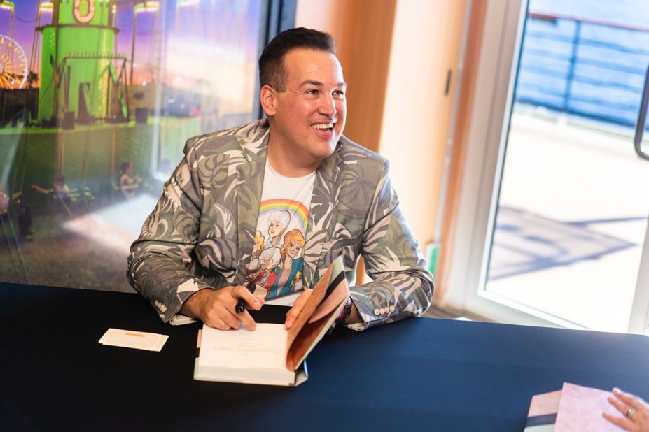 Author Jim Colucci signs autographs while aboard the Golden Fans at Sea inaugural cruise. His book "Golden Girls Forever" offers a behind-the-scenes perspective of the show following his interviews with the stars, writers, producers and guest stars.