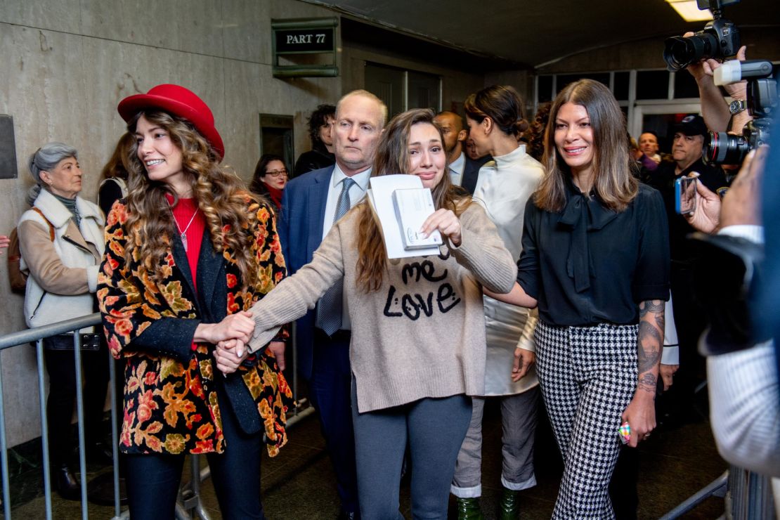 From left, actresses Lauren Young, Jessica Mann and Dawn Dunning walk out of a New York courthouse on Wednesday, March 11, after disgraced film producer Harvey Weinstein <a target="_blank">was sentenced to 23 years in prison.</a> The actresses were among those who testified against Weinstein at his trial.