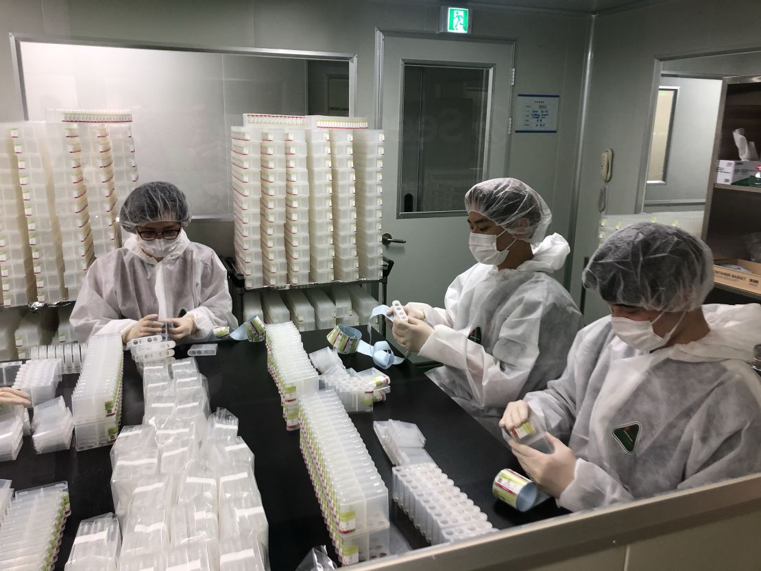 Staff at Seegene's headquarters in Seoul, South Korea, on March 6, 2020.