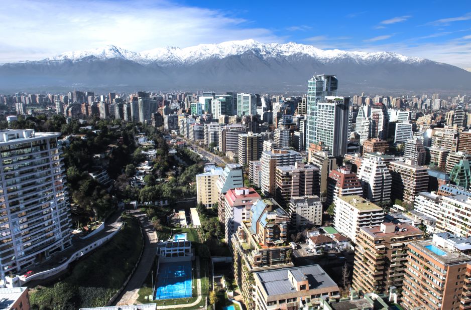 <strong>Financial district in Santiago de Chile:</strong> The country's national administrative and judicial bodies gather in this city, where skyscrapers have a backdrop of snowy mountains.