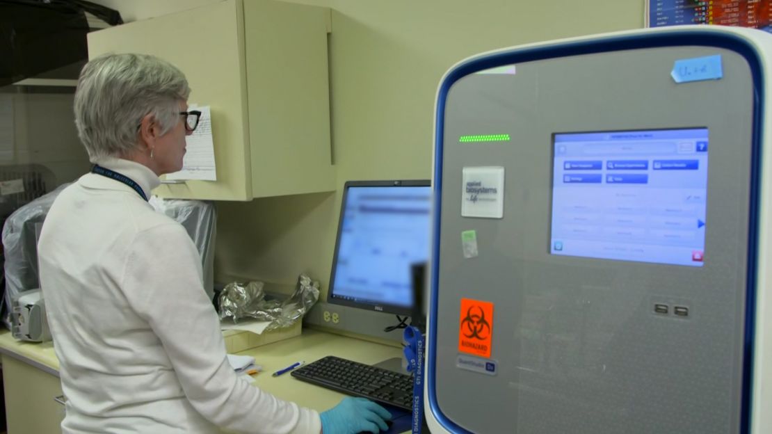 Doctors at University of Nebraska Medical Center analyze newly processed coronavirus lab test results.