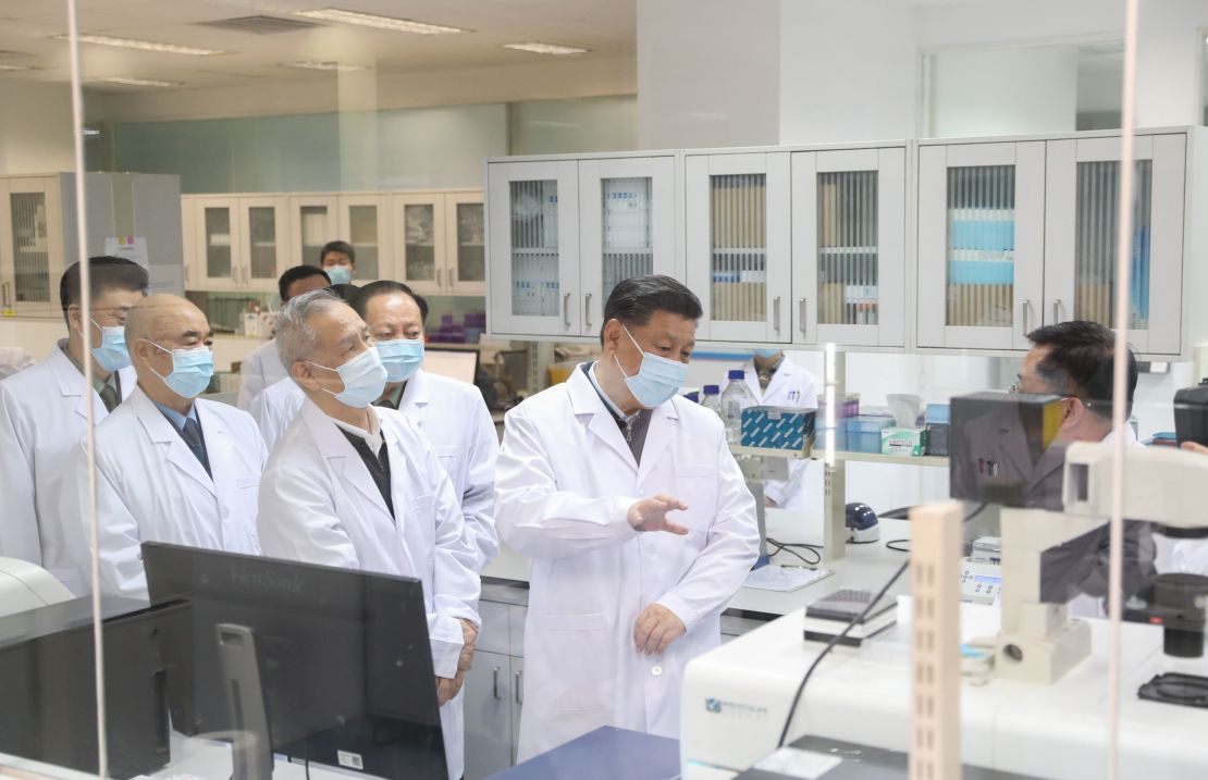 Chinese President Xi Jinping learns about the progress on a candidate coronavirus vaccine during his visit to the Academy of Military Medical Sciences in Beijing in March.