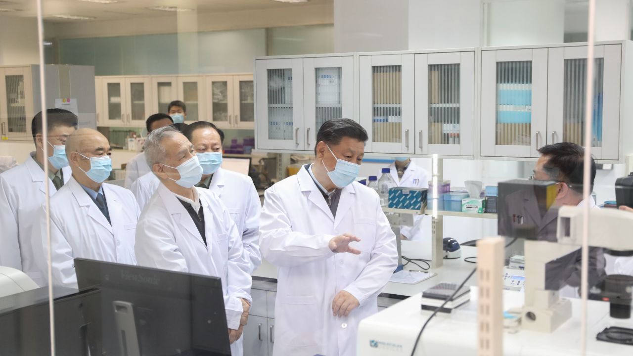 Chinese President Xi Jinping learns about the progress on a candidate coronavirus vaccine during his visit to the Academy of Military Medical Sciences in Beijing in March.