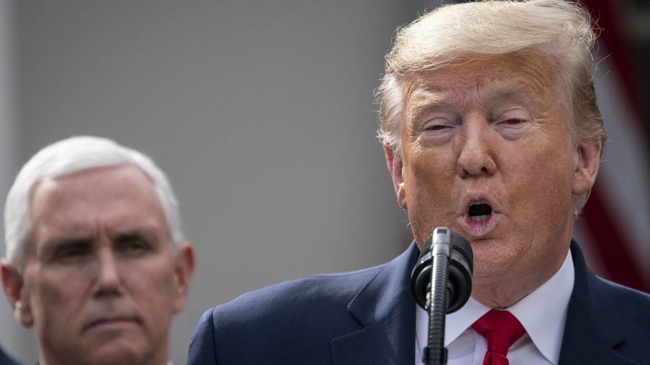 WASHINGTON, DC - MARCH 13: (L-R) Vice President Mike Pence looks on as U.S. President Donald Trump holds a news conference about the ongoing global coronavirus pandemic at the White House March 13, 2020 in Washington, DC. Trump is facing a national health emergency as COVID-19 cases continue to rise and 30 people have died from the virus in the United States, according to The Center for Systems Science and Engineering at Johns Hopkins University. (Photo by Drew Angerer/Getty Images)