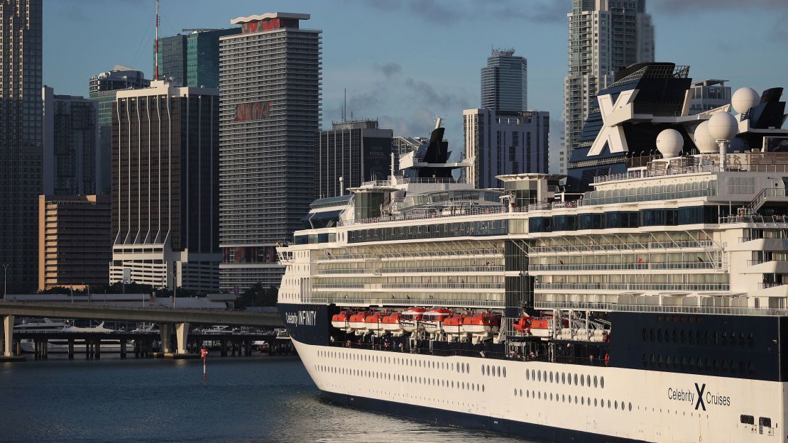 The Celebrity Infinity cruise ship returns to  port in Miami from the Caribbean as cruise lines suspend operations on March 14, 2020.