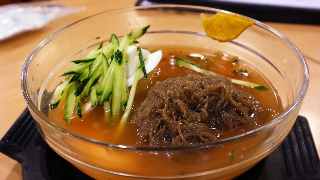 A bowl of naengmyeon, served cold, is a popular summer dish.  