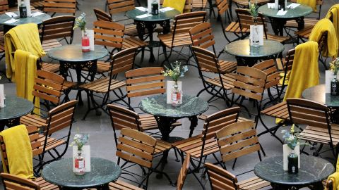 Restaurant seats stand empty in Covent Garden in London on March 13.