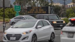 A Caltrans Changeable Message Sign (CMS) warns motorists along California State Route 135 to avoid gatherings as the threat of Coronavirus disease (COVID-19) increases throughout the nation, in Glendale, California, on March 14, 2020. - The World Health Organization said March 13, 2020 it was not yet possible to say when the COVID-19 pandemic, which has killed more than 5,000 people worldwide, will peak. "It's impossible for us to say when this will peak globally," Maria Van Kerkhove, who heads the WHO's emerging diseases unit, told a virtual press conference, adding that "we hope that it is sooner rather than later". (Photo by DAVID MCNEW / AFP) (Photo by DAVID MCNEW/AFP via Getty Images)