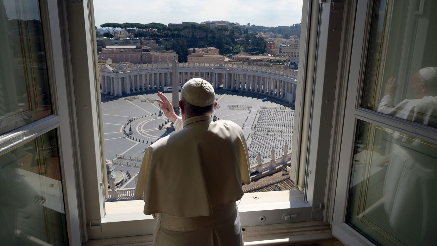 Pope Francis delivers his weekly blessing to an empty St. Peter's Square on Sunday, March 15, 2020. 