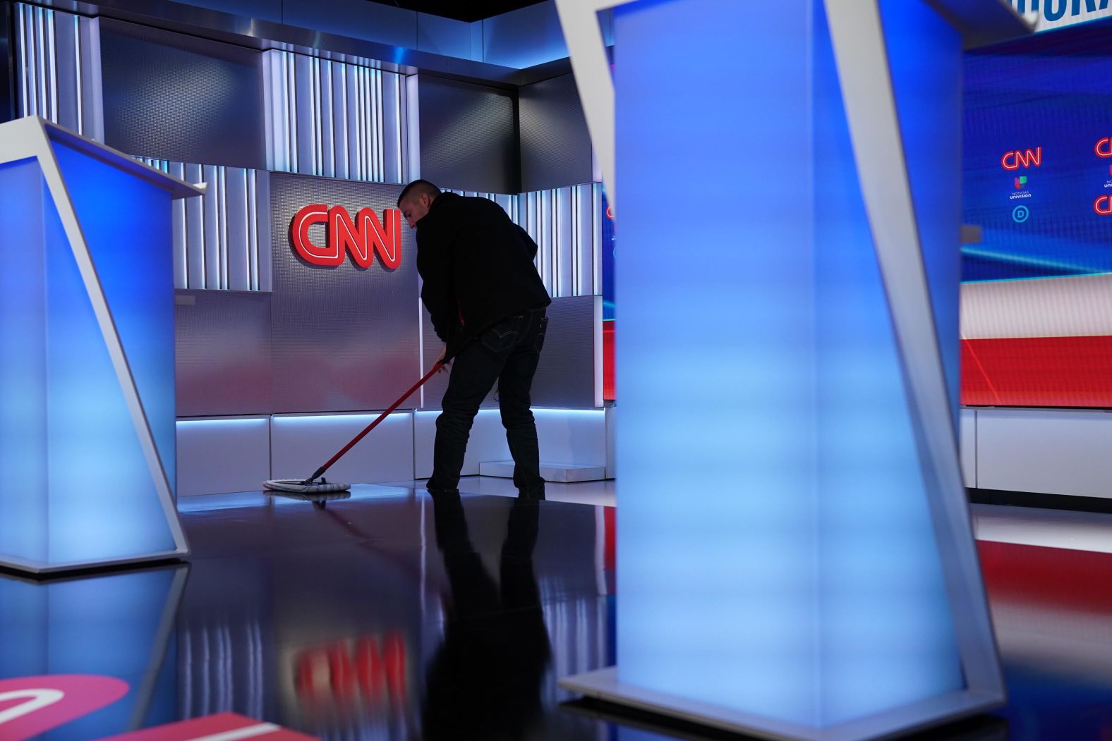 The stage is cleaned before the debate.