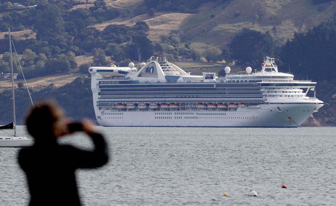 Golden Princess was anchored off New Zealand on Sunday. Some passengers were undergoing health testing.