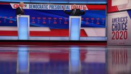 Former Vice President Joe Biden and Vermont Sen. Bernie Sanders participate in the Democratic debate in Washington, on Sunday, March 15.