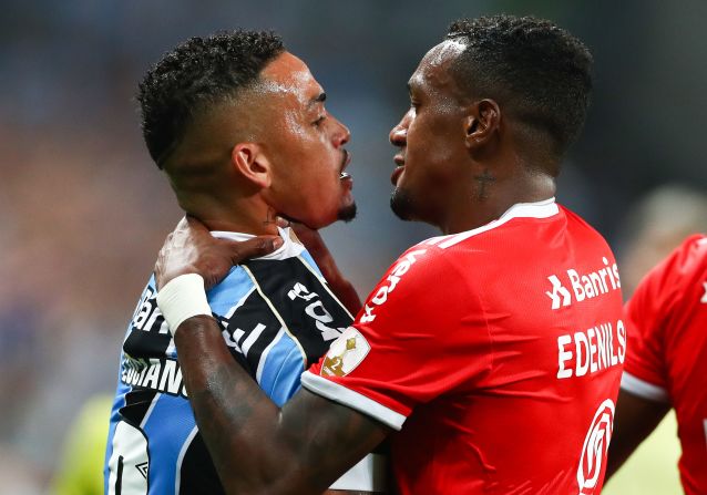 Gremio's Luciano, left , and Internacional's Edenilson have a disagreement during a Copa Libertadores match in Porto Alegre, Brazil, on Thursday, March 12.