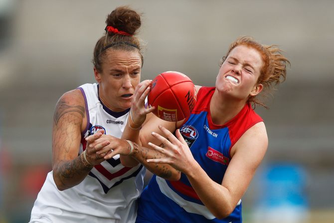 Eleanor Brown of the Western Bulldogs, right, attempts to mark the ball against Mia-Rae Clifford of the Fremantle Dockers during an Australian Football League match in Melbourne on Sunday, March 15.