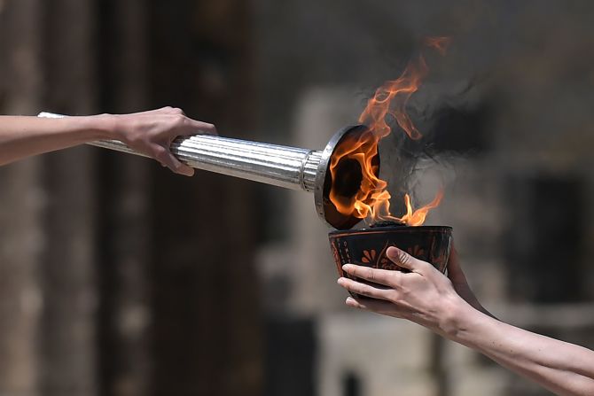 The Olympic torch is lit in Olympia, Greece, on Thursday, March 12. The Summer Olympics are scheduled to take place in Tokyo this year. <a href="index.php?page=&url=http%3A%2F%2Fwww.cnn.com%2F2020%2F03%2F09%2Fsport%2Fgallery%2Fwhat-a-shot-sports-0308%2Findex.html" target="_blank">See 29 amazing sports photos from last week</a>