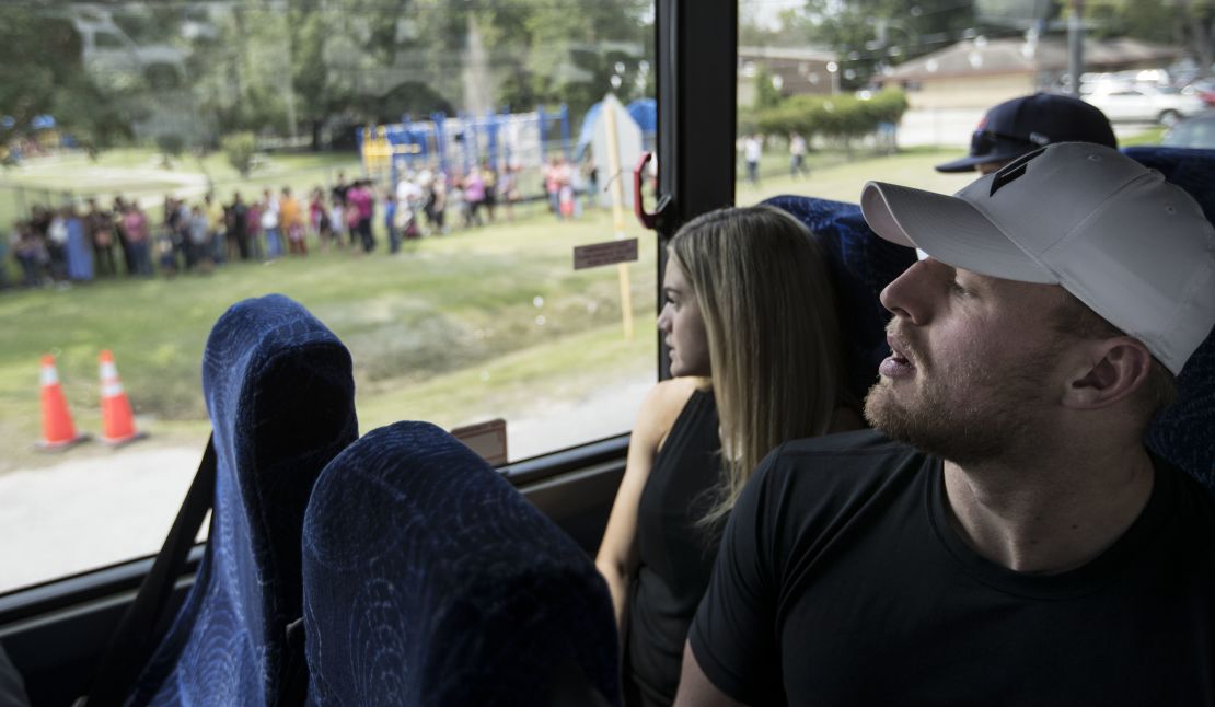 Watt and his 'JJ Watt Foundation' helped raise $41.6 million in the aftermath of Hurricane Harvey in 2017. Pictured is Watt and Ohai looking at the line of people waiting for distribution of relief supplies.