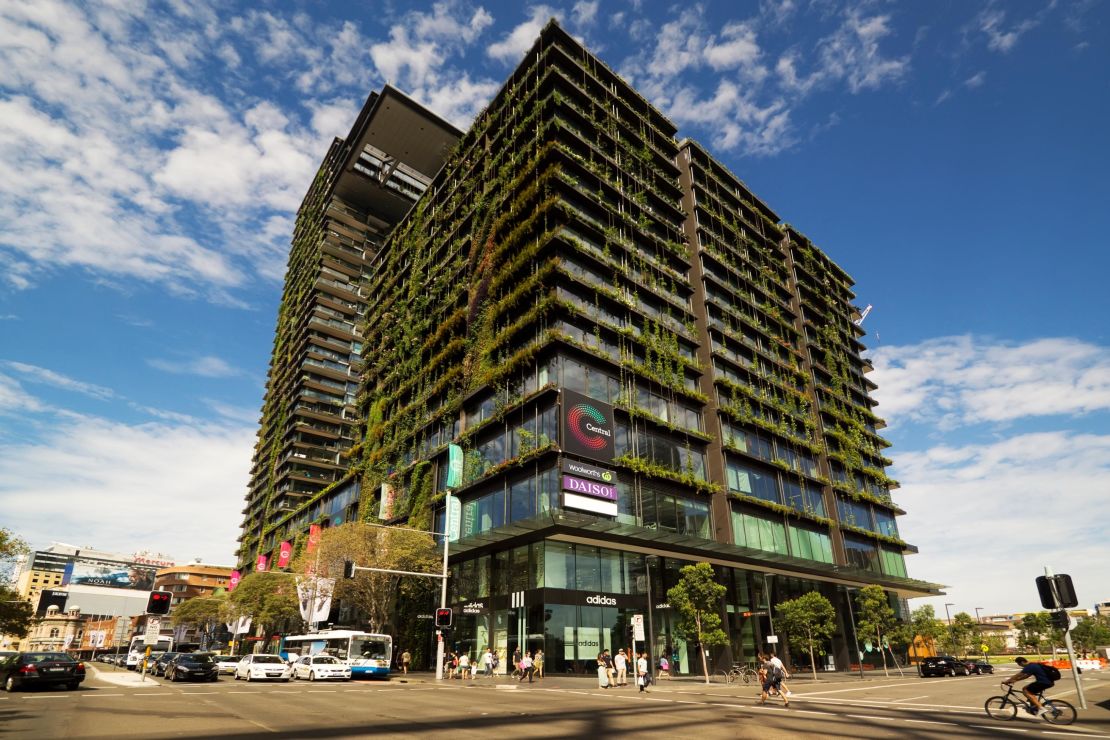 One Central Park features vertical gardens on the facade. It consists of two interconnected towers -- the shorter one is in the forefront. 