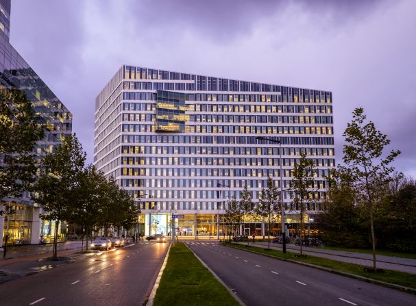 In some cities, architects are using solar technology to create buildings that aim to generate more energy than consume. Deloitte's headquarters in Amsterdam has <a href="index.php?page=&url=https%3A%2F%2Fedge.tech%2Fdevelopments%2Fthe-edge" target="_blank" target="_blank">solar panels</a> on the south side of the building, which provide energy for heating and cooling installations as well as powering the laptops and smartphones of employees.