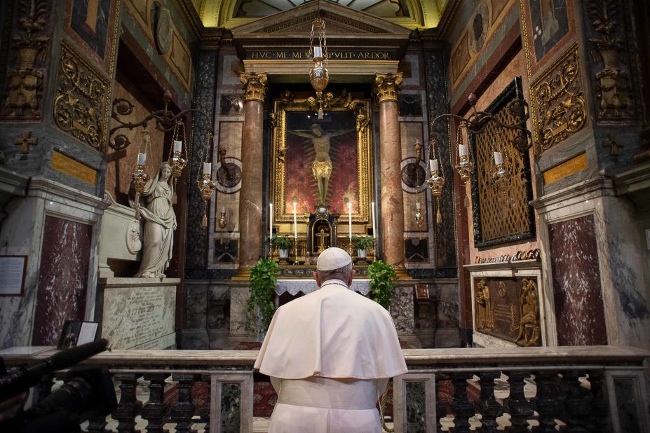 Pope Francis, inside the Church of San Marcello in Rome's city center,<a href="https://edition.cnn.com/2020/03/16/europe/pope-francis-prayer-coronavirus-plague-crucifix-intl/index.html" target="_blank"> prays at a famous crucifix</a> that believers claim helped to save Romans from the plague in 1522.