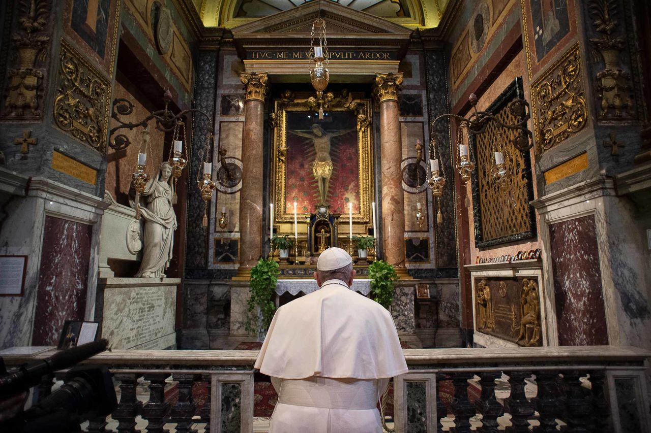 Pope Francis, inside the Church of San Marcello in Rome's city center,<a href="https://edition.cnn.com/2020/03/16/europe/pope-francis-prayer-coronavirus-plague-crucifix-intl/index.html" target="_blank"> prays at a famous crucifix</a> that believers claim helped to save Romans from the plague in 1522.