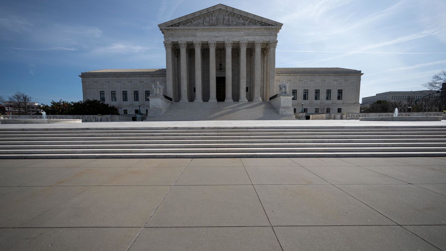 The U.S. Supreme Court stands on March 16, 2020 in Washington, DC. The Supreme Court announced on Monday that it would postpone oral arguments for its March session because of the coronavirus outbreak.