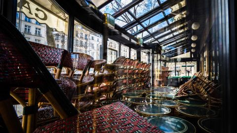 Stacked furniture is seen inside the closed Cafe de Flore in Paris on March 15.
