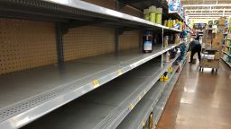 Empty shelves for toilet paper and sanitizer at a local Walmart in Dallas, Texas, USA, 13 March 2020. US President Donald J. Trump declared a national emergency due to the COVID-19 coronavirus pandemic on 13 March. (Photo by Larry W. Smith/EPA-EFE/Shutterstock) 