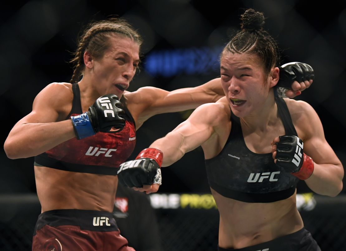 Weili Zhang punches Joanna Jedrzejczyk during UFC 248, the last UFC event to take place in front of fans.