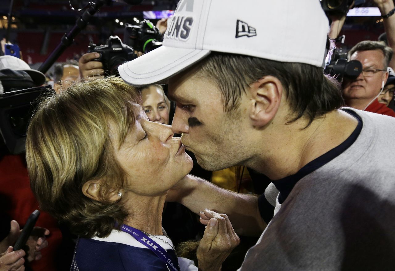 Brady kisses his mother, Galynn, after the Patriots defeated Seattle for their fourth Super Bowl title in February 2015.