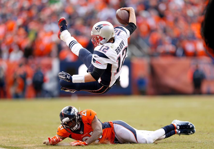 Brady is tackled by Denver's Aqib Talib in the AFC Championship game in January 2016.